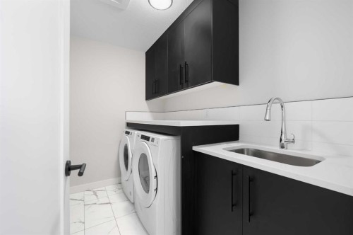 26 Walgrove Bay Se, Calgary, AB - Indoor Photo Showing Laundry Room