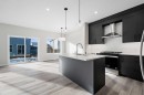 26 Walgrove Bay Se, Calgary, AB  - Indoor Photo Showing Kitchen With Upgraded Kitchen 