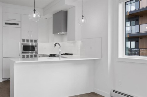 402-8370 Broadcast Avenue Sw, Calgary, AB - Indoor Photo Showing Kitchen