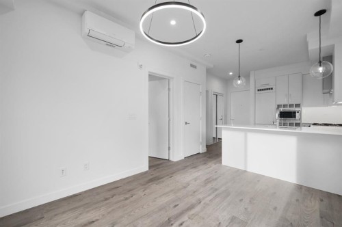 402-8370 Broadcast Avenue Sw, Calgary, AB - Indoor Photo Showing Kitchen