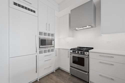 402-8370 Broadcast Avenue Sw, Calgary, AB - Indoor Photo Showing Kitchen With Upgraded Kitchen