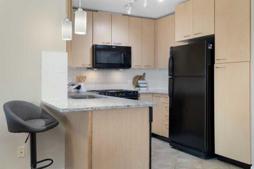 408-5115 Richard Road Sw, Calgary, AB - Indoor Photo Showing Kitchen