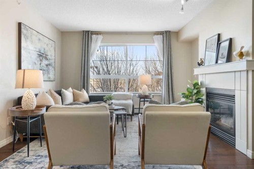 408-5115 Richard Road Sw, Calgary, AB - Indoor Photo Showing Other Room With Fireplace