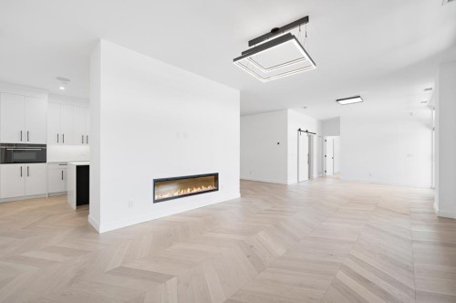 112-835 78 Street Sw, Calgary, AB - Indoor With Fireplace