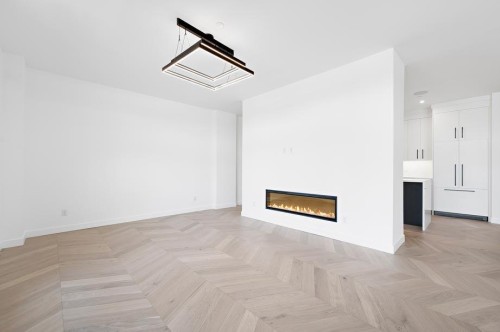 112-835 78 Street Sw, Calgary, AB - Indoor With Fireplace