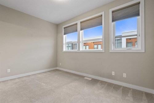 62 Norford Common Nw, Calgary, AB - Indoor Photo Showing Other Room