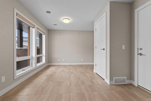 62 Norford Common Nw, Calgary, AB - Indoor Photo Showing Other Room