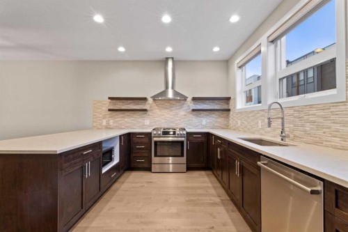 62 Norford Common Nw, Calgary, AB - Indoor Photo Showing Kitchen With Stainless Steel Kitchen With Upgraded Kitchen
