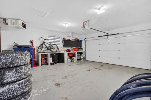 109 Legacy Glen Point Se, Calgary, AB - Indoor Photo Showing Garage