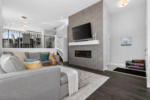 109 Legacy Glen Point Se, Calgary, AB - Indoor Photo Showing Living Room With Fireplace