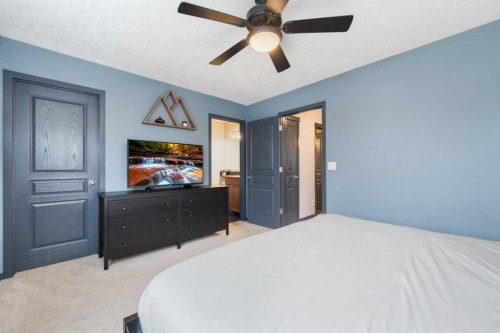 44 Cranberry Way Se, Calgary, AB - Indoor Photo Showing Bedroom