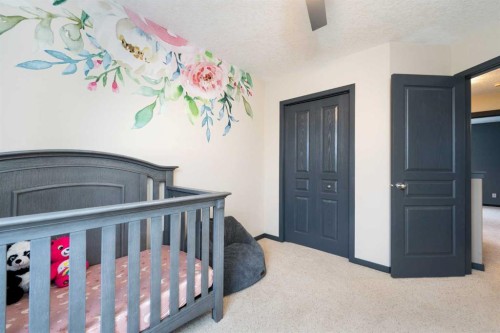 44 Cranberry Way Se, Calgary, AB - Indoor Photo Showing Bedroom