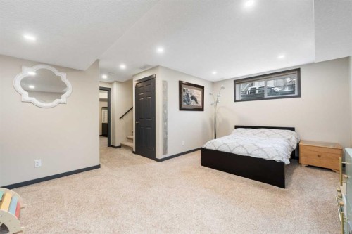 44 Cranberry Way Se, Calgary, AB - Indoor Photo Showing Bedroom