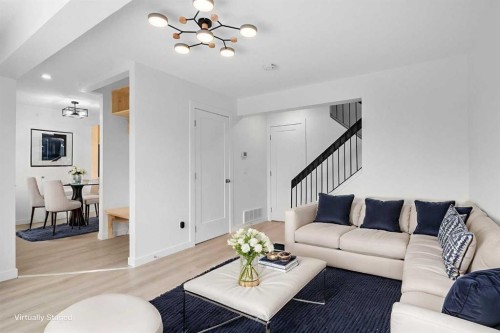 10-1055 72 Avenue Nw, Calgary, AB - Indoor Photo Showing Living Room