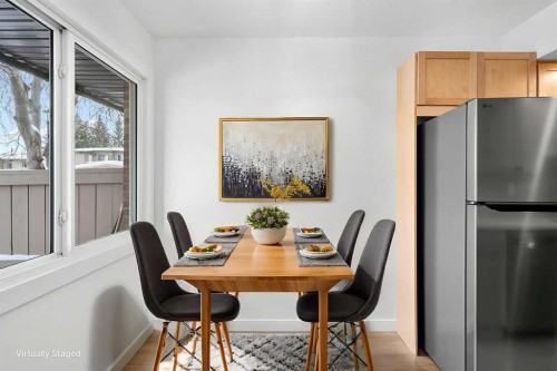 10-1055 72 Avenue Nw, Calgary, AB - Indoor Photo Showing Dining Room