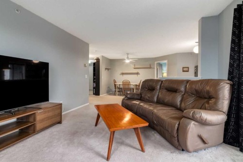 3313-20 Harvest Rose Park Ne, Calgary, AB - Indoor Photo Showing Living Room