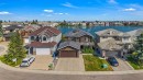 155 Coral Shores Landing Ne, Calgary, AB  - Outdoor With Body Of Water With Facade 