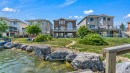 155 Coral Shores Landing Ne, Calgary, AB  - Outdoor With Body Of Water With Deck Patio Veranda 