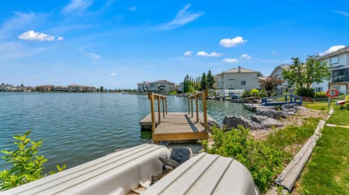 155 Coral Shores Landing Ne, Calgary, AB - Outdoor With Body Of Water
