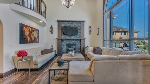 155 Coral Shores Landing Ne, Calgary, AB - Indoor Photo Showing Living Room With Fireplace