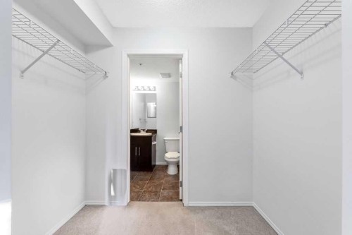 9113-403 Mackenzie Way Sw, Airdrie, AB - Indoor