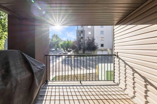 9113-403 Mackenzie Way Sw, Airdrie, AB - Outdoor With Balcony With Exterior