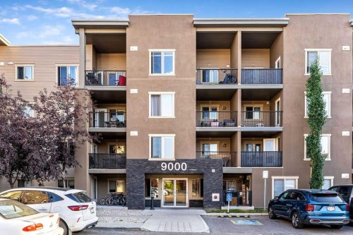 9113-403 Mackenzie Way Sw, Airdrie, AB - Outdoor With Balcony With Facade