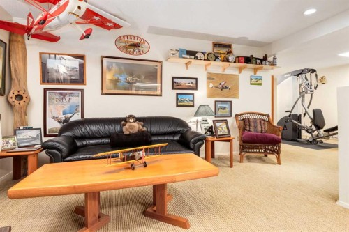 21 Midridge Green Se, Calgary, AB - Indoor Photo Showing Living Room