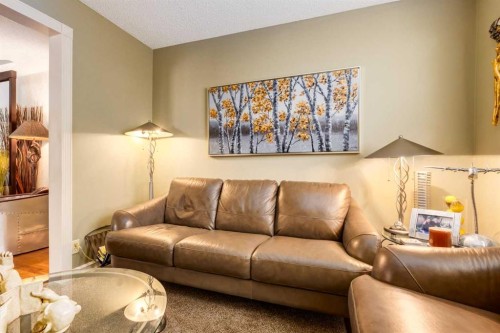 21 Midridge Green Se, Calgary, AB - Indoor Photo Showing Living Room