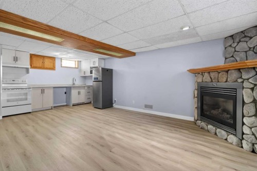 159 Pinecliff Way Ne, Calgary, AB - Indoor With Fireplace
