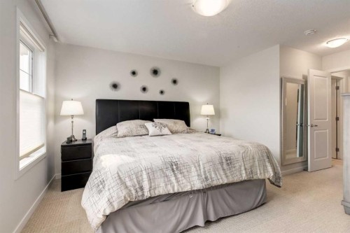 165 Sundown Road, Cochrane, AB - Indoor Photo Showing Bedroom