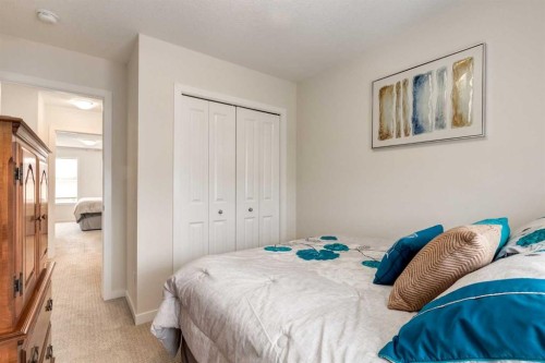 165 Sundown Road, Cochrane, AB - Indoor Photo Showing Bedroom