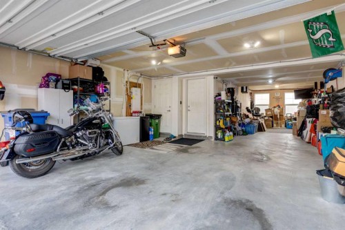 165 Sundown Road, Cochrane, AB - Indoor Photo Showing Garage