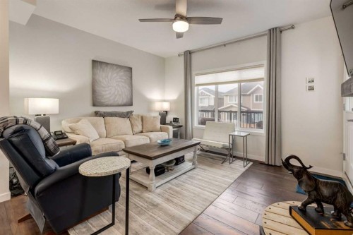 165 Sundown Road, Cochrane, AB - Indoor Photo Showing Living Room