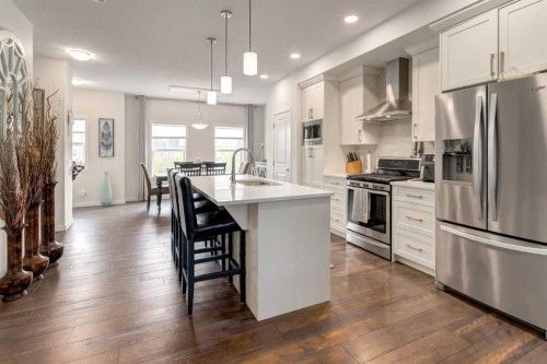 165 Sundown Road, Cochrane, AB - Indoor Photo Showing Kitchen With Stainless Steel Kitchen With Upgraded Kitchen