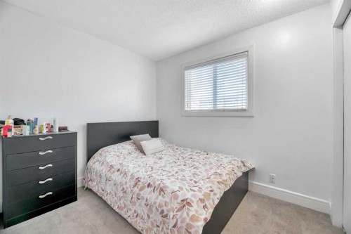19 Castlepark Way Ne, Calgary, AB - Indoor Photo Showing Bedroom