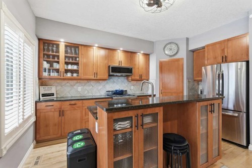 45 Somme Boulevard Sw, Calgary, AB - Indoor Photo Showing Kitchen With Stainless Steel Kitchen