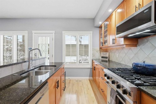 45 Somme Boulevard Sw, Calgary, AB - Indoor Photo Showing Kitchen With Double Sink With Upgraded Kitchen