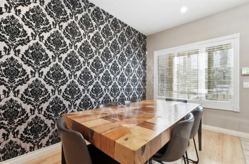 45 Somme Boulevard Sw, Calgary, AB - Indoor Photo Showing Dining Room