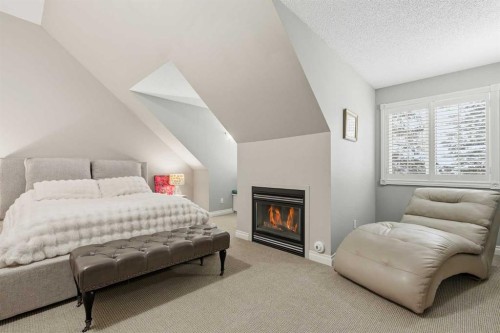 45 Somme Boulevard Sw, Calgary, AB - Indoor Photo Showing Bedroom