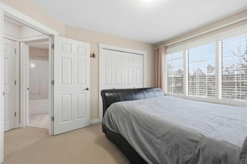 45 Somme Boulevard Sw, Calgary, AB - Indoor Photo Showing Bedroom