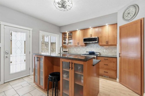 45 Somme Boulevard Sw, Calgary, AB - Indoor Photo Showing Kitchen