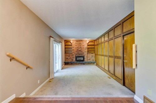 1257 Varsity Estates Road Nw, Calgary, AB - Indoor Photo Showing Other Room With Fireplace