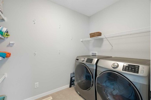 68 Masters Street Se, Calgary, AB - Indoor Photo Showing Laundry Room