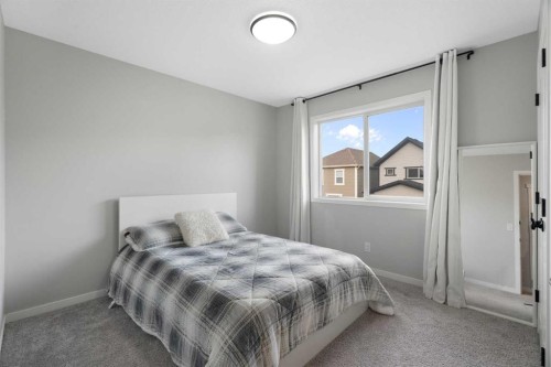 68 Masters Street Se, Calgary, AB - Indoor Photo Showing Bedroom