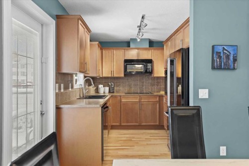 8910 Royal Oak Way Nw, Calgary, AB - Indoor Photo Showing Kitchen With Double Sink