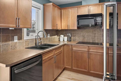8910 Royal Oak Way Nw, Calgary, AB - Indoor Photo Showing Kitchen With Double Sink