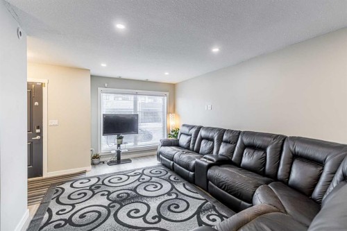 228 Red Embers Way Ne, Calgary, AB - Indoor Photo Showing Living Room