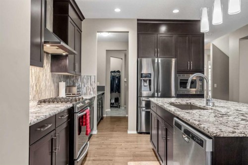 47 Nolancliff Place Nw, Calgary, AB - Indoor Photo Showing Kitchen With Upgraded Kitchen