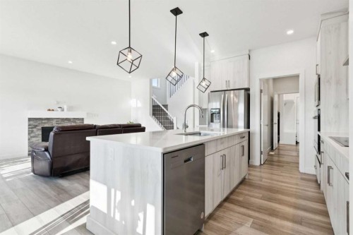 51 Midgrove Drive Sw, Airdrie, AB - Indoor Photo Showing Kitchen With Upgraded Kitchen